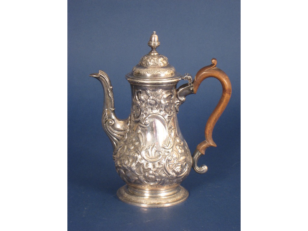 Appraisal: A George II baluster Coffee Pot with floral and scroll