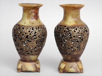 Appraisal: PAIR OF CHINESE SOAP STONE AND GILT-METAL VASES Each pierced