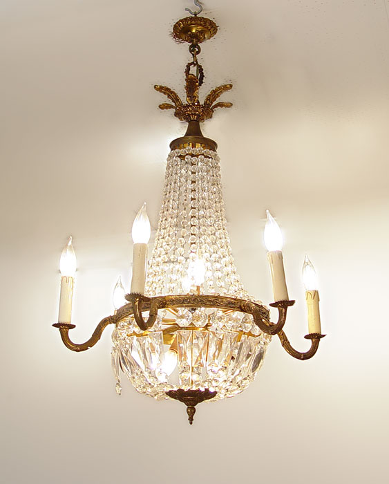 Appraisal: FRENCH EMPIRE STYLE CRYSTAL CHANDELIER lights prism chains approx ''dia