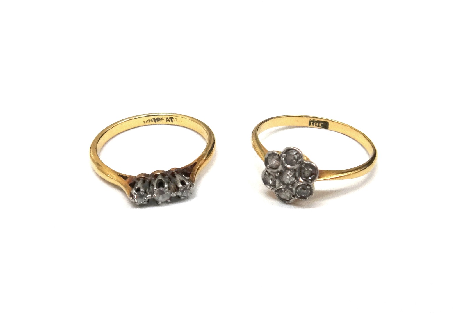 Appraisal: A gold and seven stone diamond cluster ring detailed ct