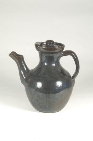 Appraisal: Unsigned Att ML Owens Black teapot with lidExcellentEverette James