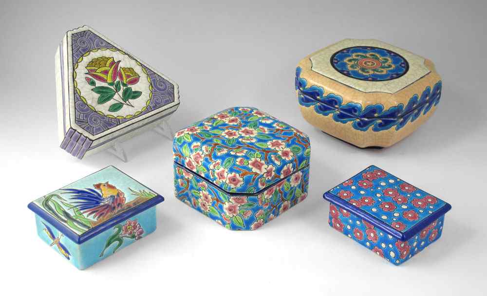 Appraisal: GROUP OF LONGWY FRENCH POTTERY COVERED BOXES French Faience covered