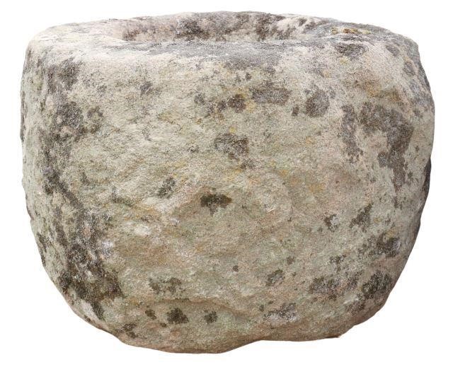 Appraisal: Rustic stone basin mortar th c irregular cylindrical form approx