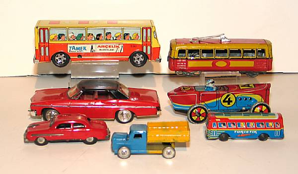 Appraisal: European Transportation Toys Assortment of tin lithographed cars buses trucks