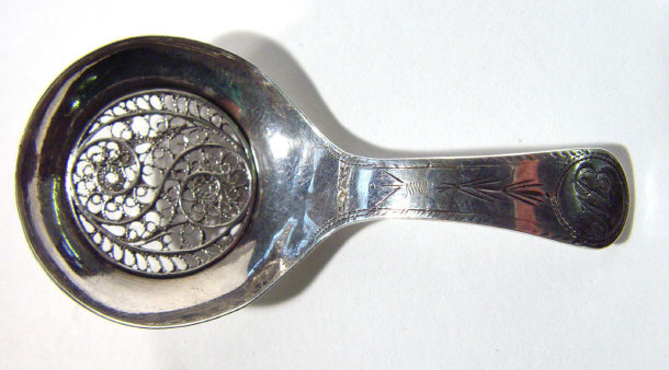 Appraisal: Silver metal caddy spoon with filigree bowl and chased handled