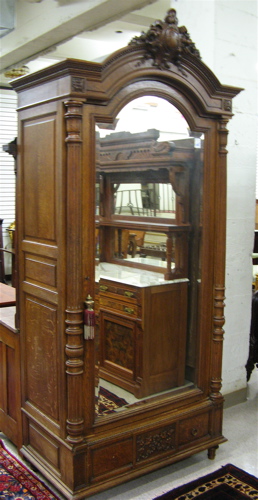 Appraisal: LOUIS XVI STYLE OAK ARMOIRE French c The molded arch