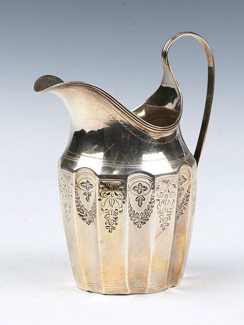 Appraisal: A GEORGE III SILVER CREAM JUG with fluted sides reeded