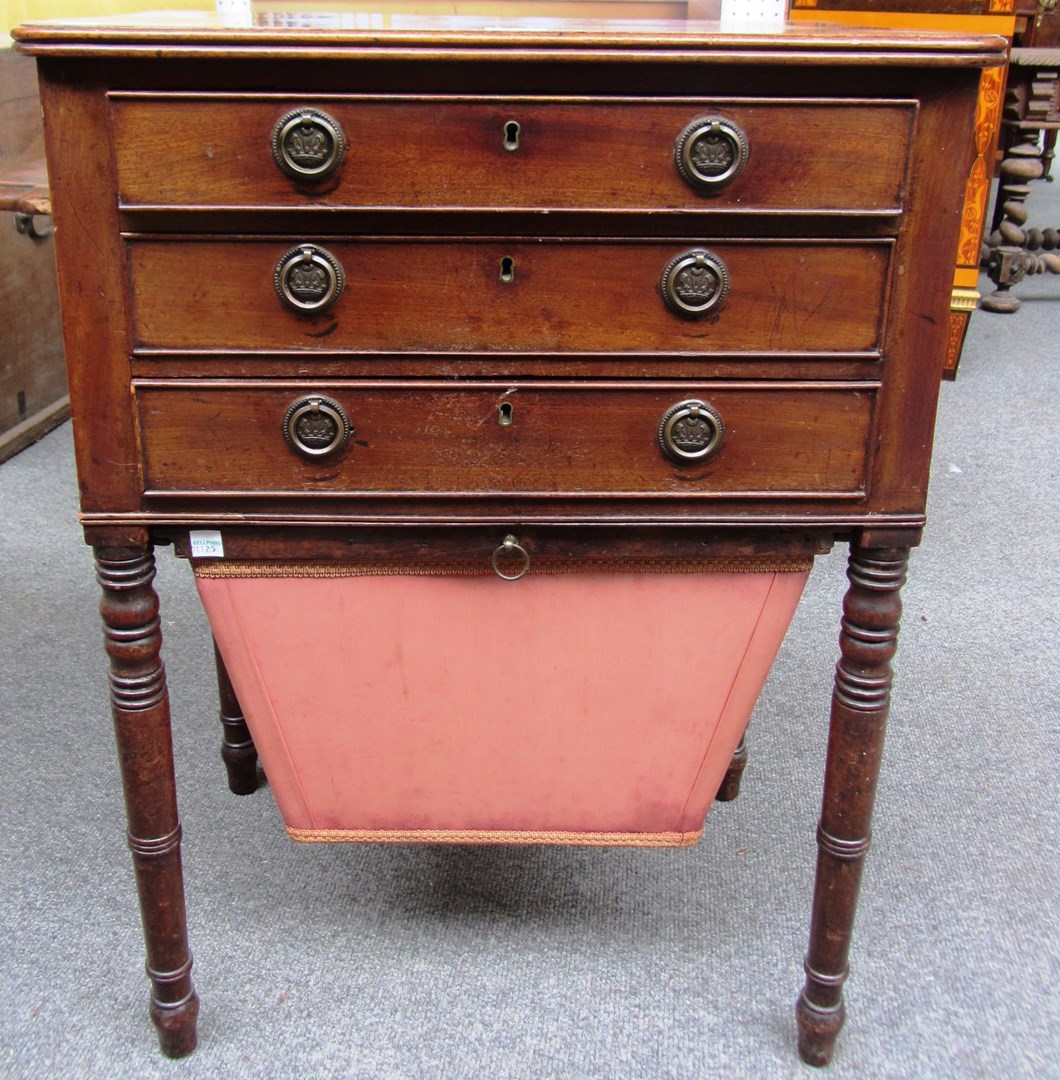 Appraisal: An early th century mahogany single drop-flap work table with