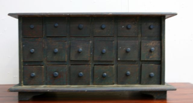 Appraisal: A cedar and pine turquoise painted eighteen-drawer apothecary's cabinet cm