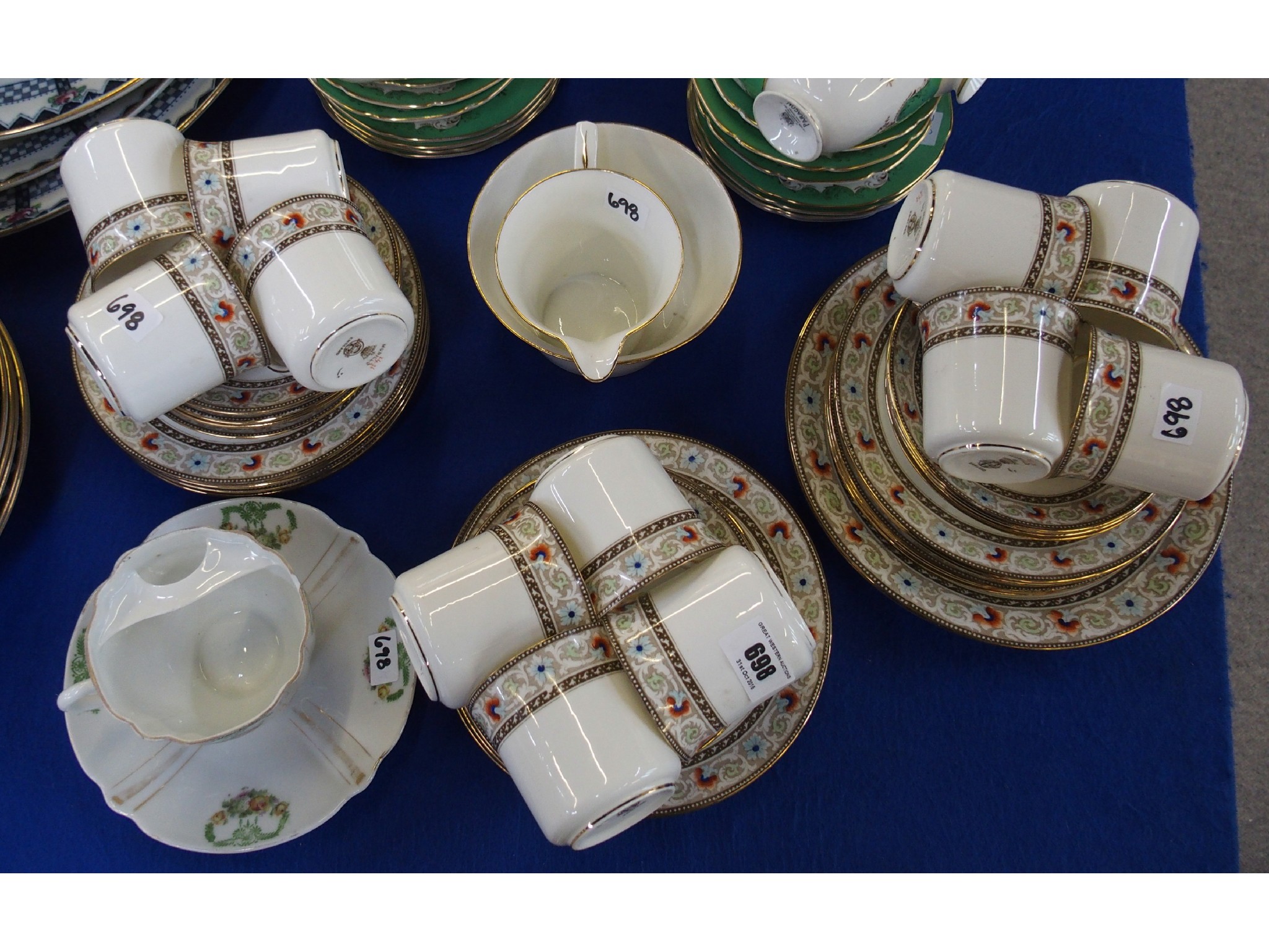 Appraisal: English porcelain tea set for twelve with sugar bowl and