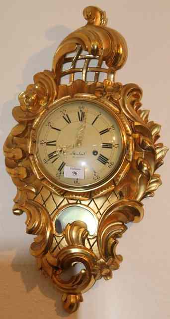 Appraisal: A MODERN GILT CARTEL CLOCK with flamboyant acanthus decoration with