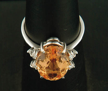 Appraisal: K WHITE GOLD DIAMOND AND IMPERIAL TOPAZ RING Setting marked