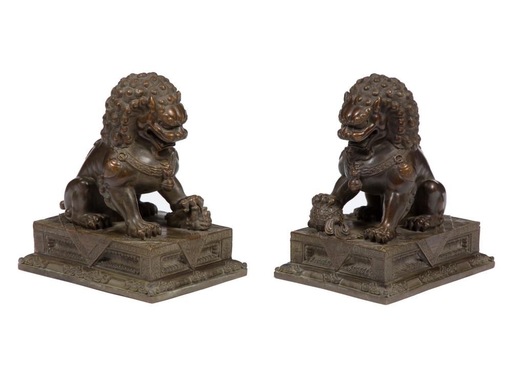 Appraisal: PAIR OF CHINESE BRONZE BUDDHIST LIONSPair of Chinese Bronze Buddhist