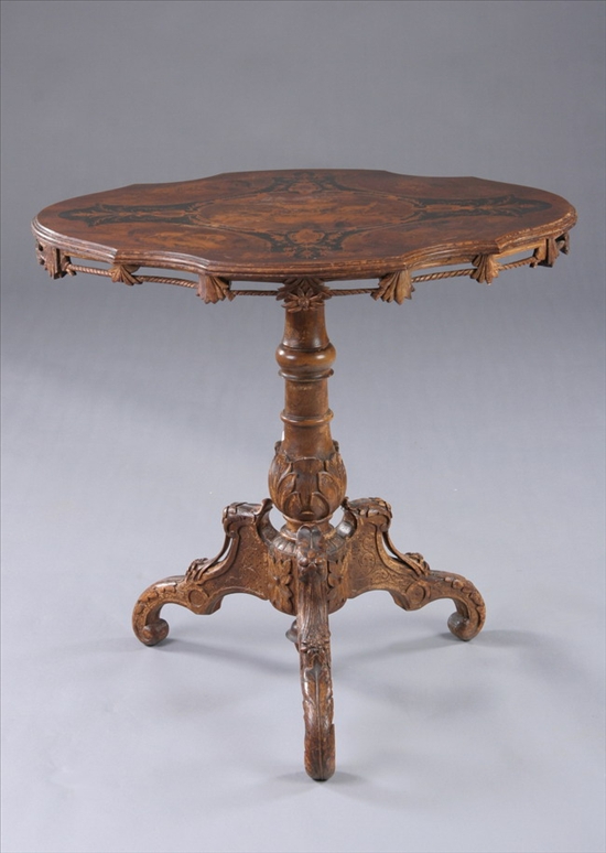 Appraisal: CONTINENTAL MARQUETRY INLAID CARVED WALNUT TILT-TOP TRIPOD TABLE th century