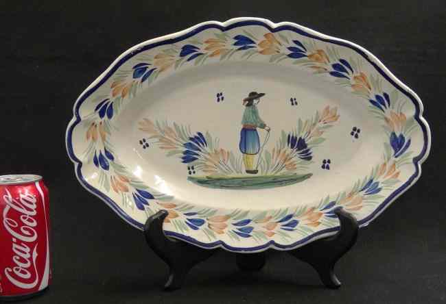 Appraisal: Quimper platter with Breton peasant design By Henriot '' length