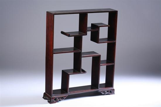 Appraisal: CHINESE HARDWOOD ETAGERE th century Rectangular outline with divided stepped