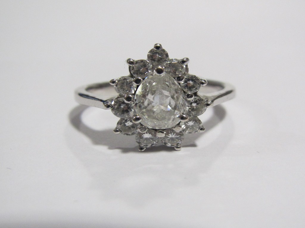 Appraisal: A white metal pear shaped diamond cluster ring the central