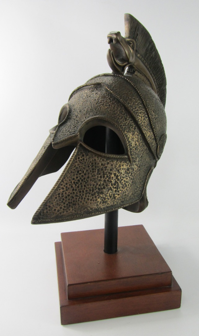 Appraisal: A plaster model of a Trojan helmet moulded on a