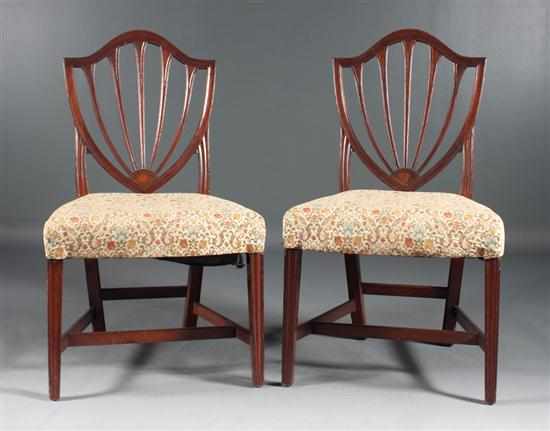 Appraisal: Pair of Federal patera inlaid mahogany shield-back side chairs Massachusetts