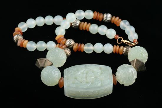 Appraisal: JADE AND BROWN BEAD FASHION NECKLACE