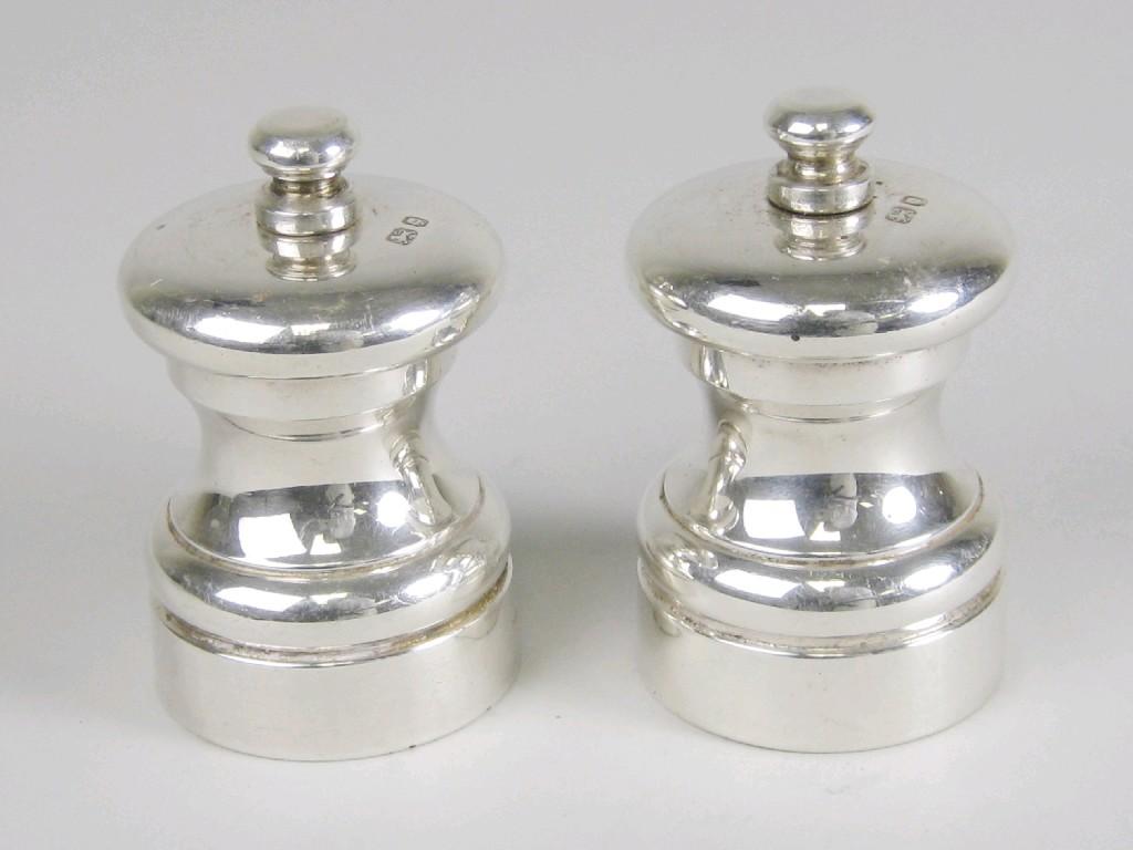 Appraisal: Pair of modern silver Pepper Mills London