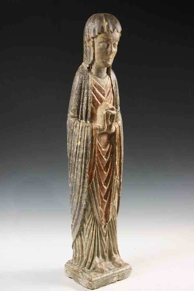 Appraisal: POLYCHROMED LIMESTONE STATUE - Medieval Limestone Statue of a Standing