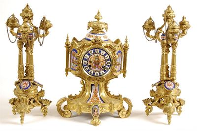 Appraisal: A late th century gilt brass and porcelain mounted clock