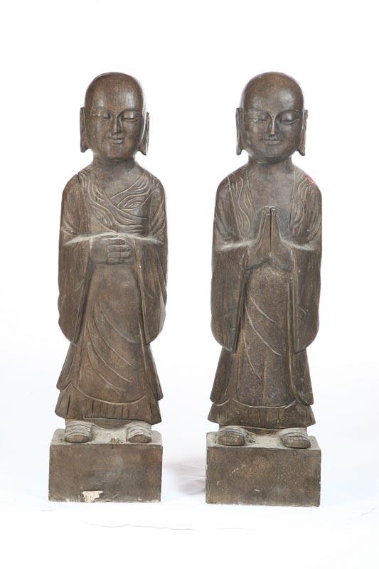 Appraisal: PAIR OF STONE STATUES Asian th century Buddhist Lohan figures