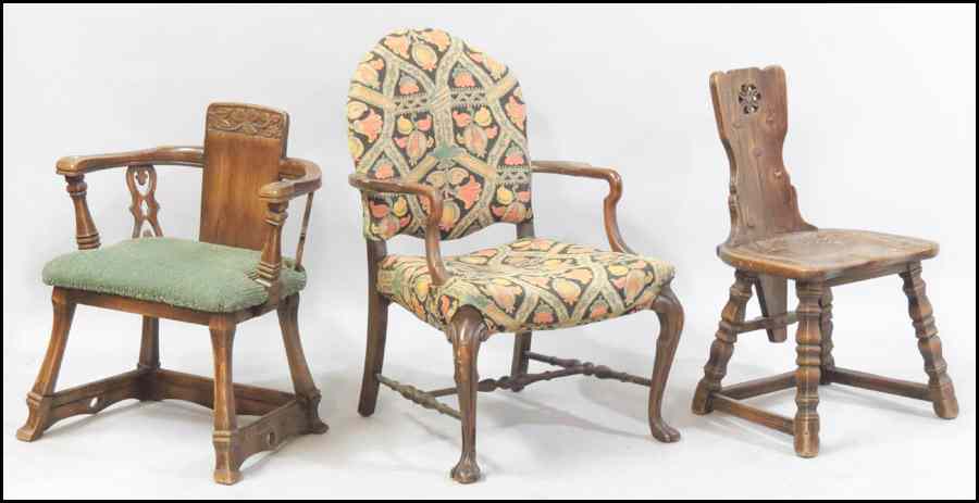 Appraisal: TWO CARVED OAK ARTS AND CRAFTS CHAIRS Together with a