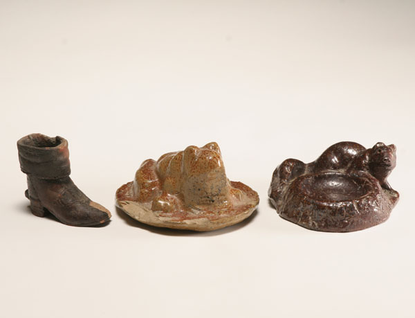 Appraisal: Three figural sewer tile pieces glazed frog and squirrel along