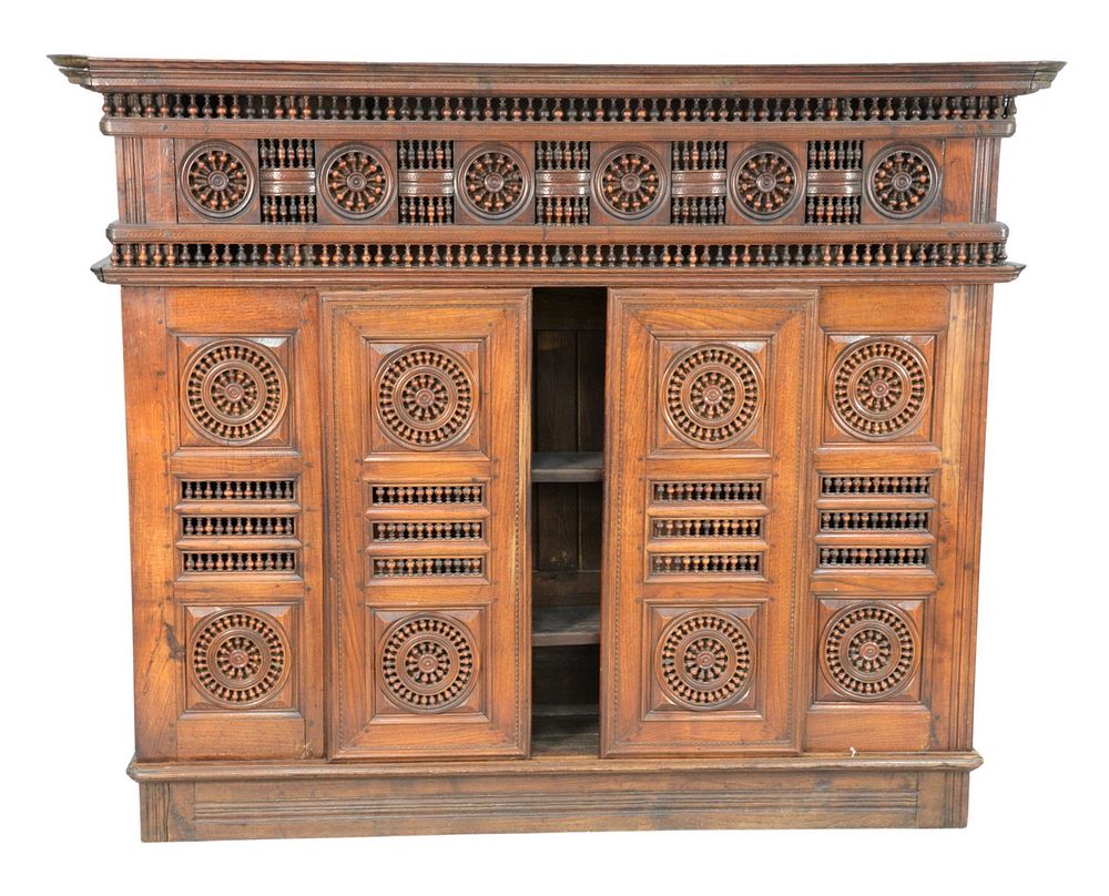 Appraisal: Walnut Two Part Cabinet with sliding doors and carved spindles