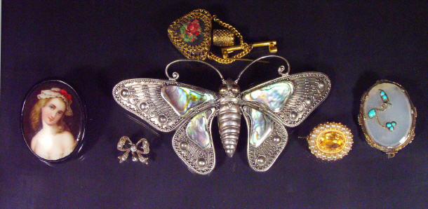 Appraisal: Victorian gold pearl brooch silver and abalone butterfly hairclip hand