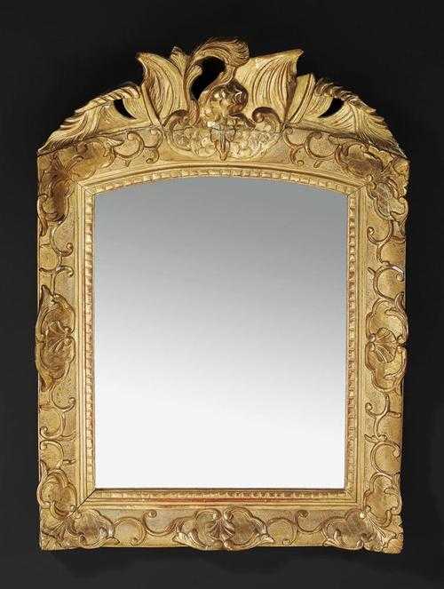 Appraisal: SMALL PIERCED AND CARVED GILTWOOD MIRROR R gence Northern Italy