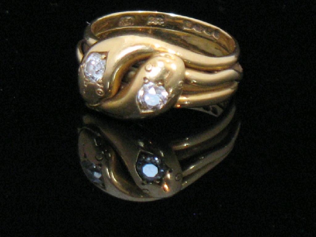 Appraisal: A VICTORIAN STYLE ENTWINED SERPENT DRESS RING the two twisted