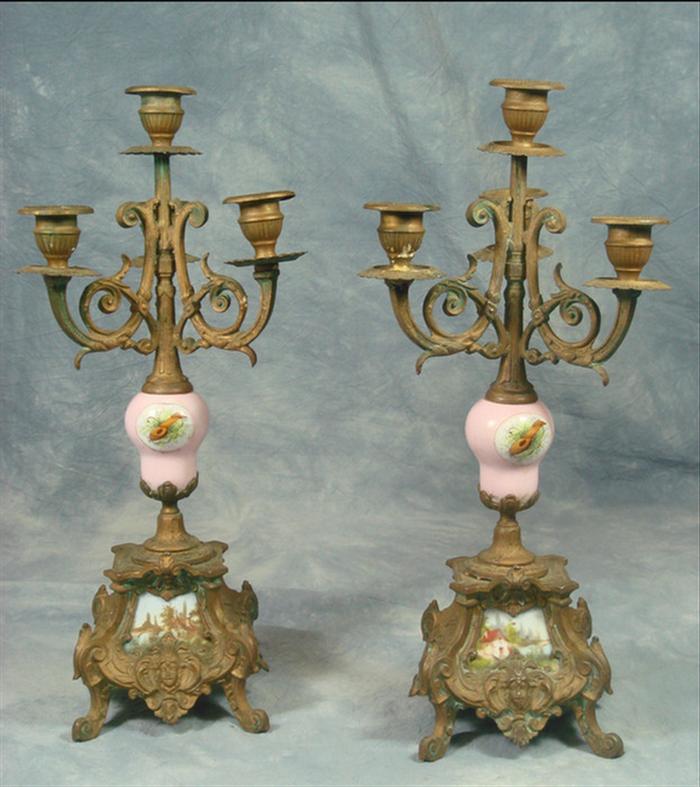 Appraisal: Pr white metal candelabra with porcelain inserts h some discoloration