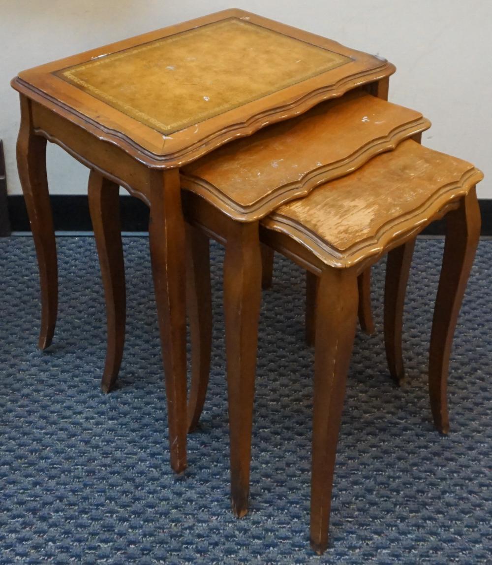 Appraisal: NEST OF THREE GEORGE III STYLE TOOLED LEATHER INSET TABLES