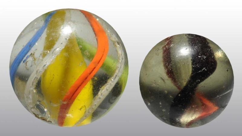 Appraisal: Lot of Handmade Swirl Marbles Description A few small hits