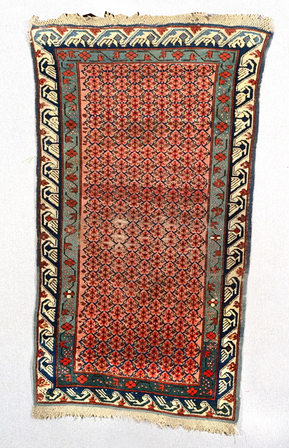 Appraisal: A KUBA RUG decorated a continuing foliate pattern on a