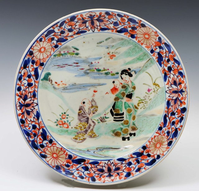 Appraisal: A JAPANESE IMARI PORCELAIN DISH the centre painted with figures