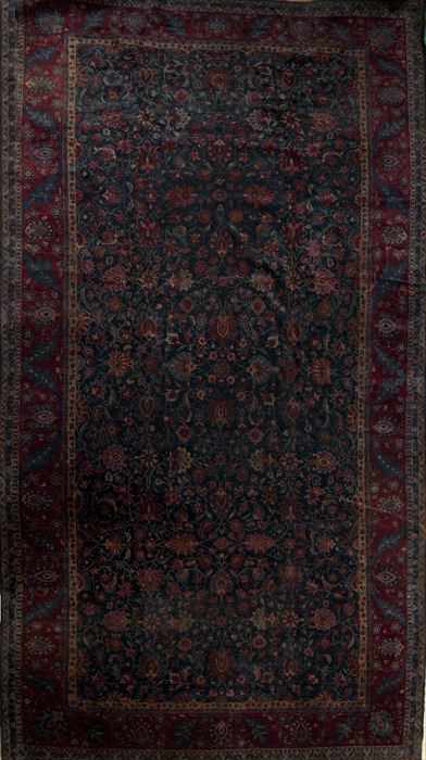 Appraisal: SAROUK CARPET Worked with floral vinework over a cobalt ground