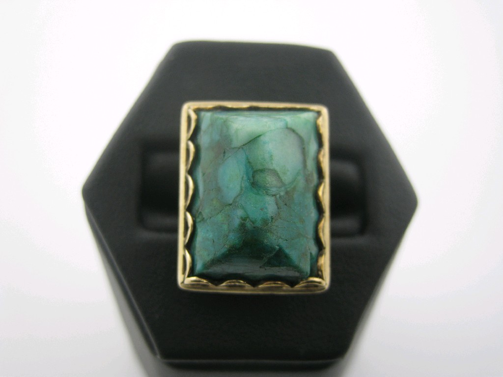 Appraisal: A Green Agate Dress Ring the large oblong cabochon x