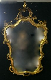 Appraisal: A Rococo style gilt framed mirror cm high cm wide