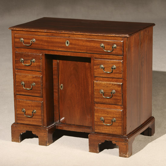 Appraisal: George III Style Mahogany Kneehole Desk th Century Height -