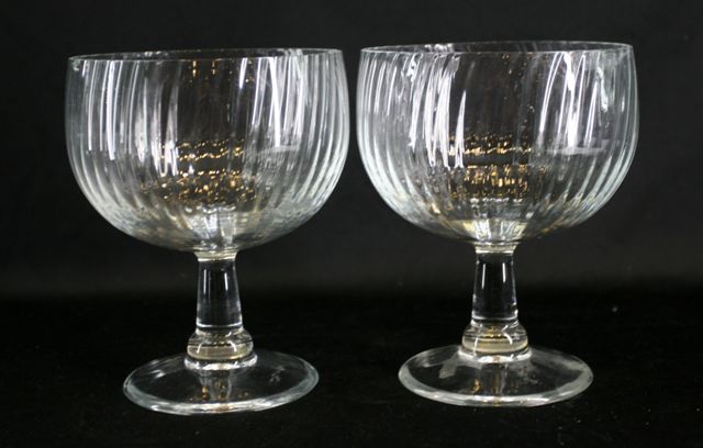 Appraisal: A pair of Georgian style pedestal goblets with fluted bowls