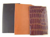 Appraisal: Three leather wallets one crocodile with silver mounts another with