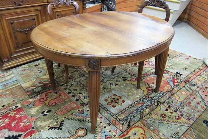 Appraisal: REGENCY STYLE OVAL WALNUT DINING TABLE Belgian c the round