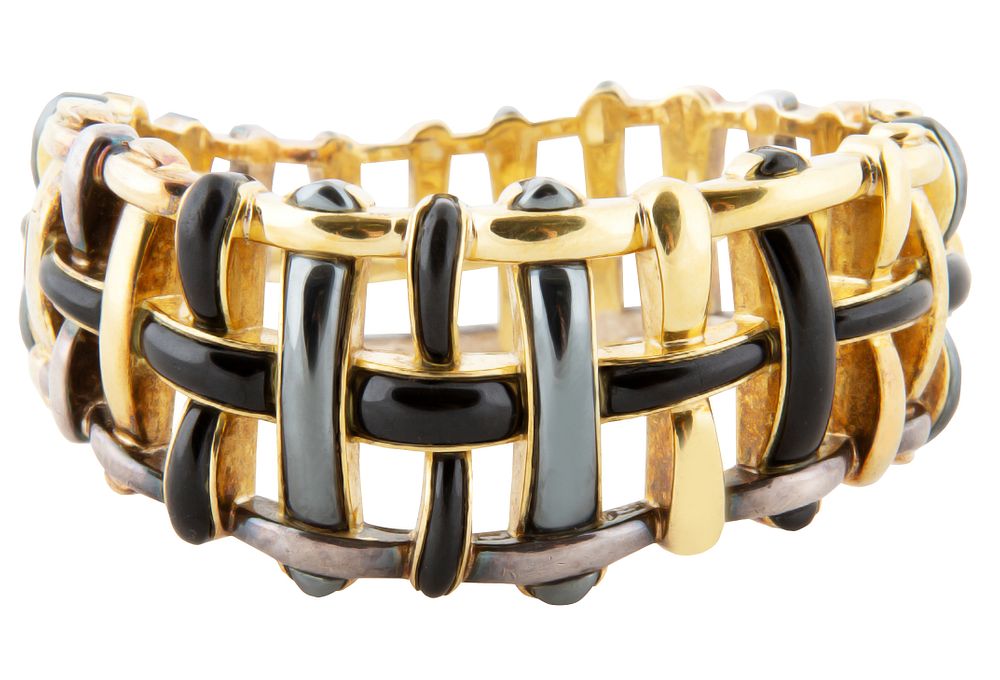 Appraisal: AN KT GOLD AND ENAMEL WOVEN BRACELET ANGELA CUMMINGS FOR