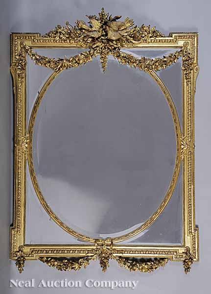 Appraisal: An Antique Carved Giltwood Overmantel Mirror th c in the