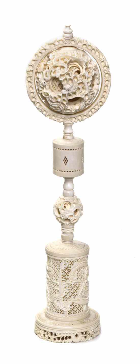 Appraisal: An Ivory Puzzle Ball and Stand the carved spheres contained