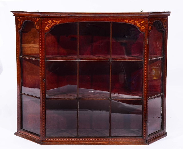 Appraisal: A DUTCH MAHOGANY AND FLORAL MARQUETRY WALL CABINET the interior